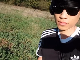 Jon Arteen pulls out his beautiful penis and urinates outdoors. Asian gay pornography featuring an effeminate young man. chinese gay porn 2022